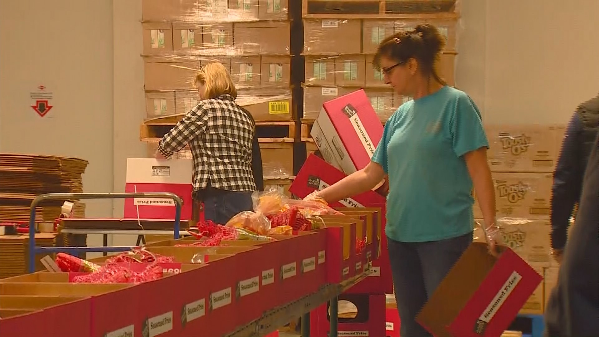 Micron employees donate hams and turkeys to foodbank